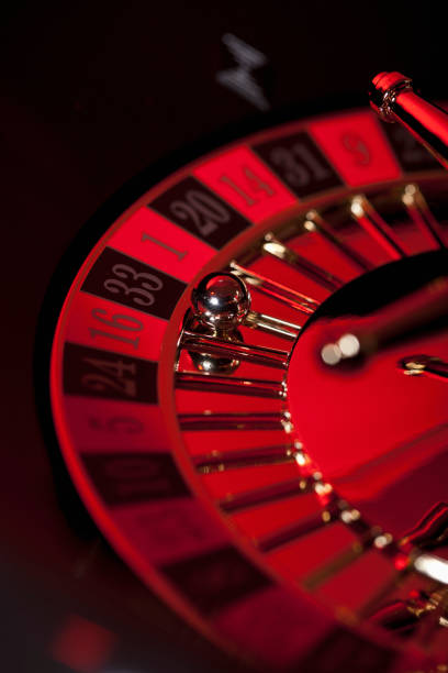 Mobile phone displaying balon4d login live casino interface with roulette table